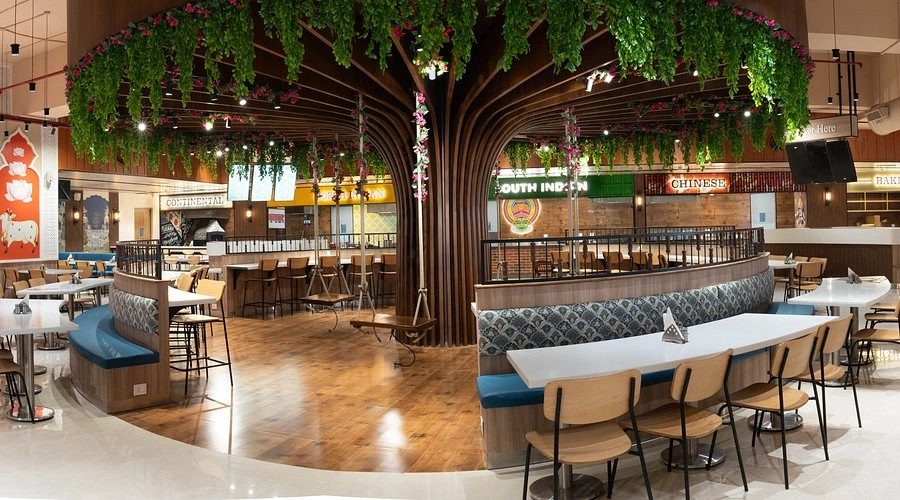 Families, devotees and travelers dining at Annakoot, the best pure vegetarian restaurant in Vrindavan near Prem Mandir