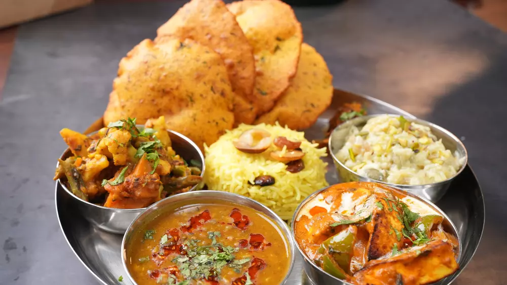 Sattvik no onion no garlic food served at Annakoot Restaurant Vrindavan in traditional style