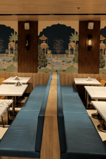 Premium vegetarian restaurant ambience inspired by Indian temple culture